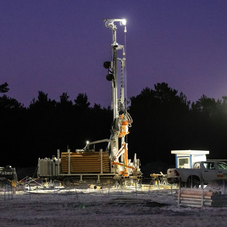 Water well drilling rig at work