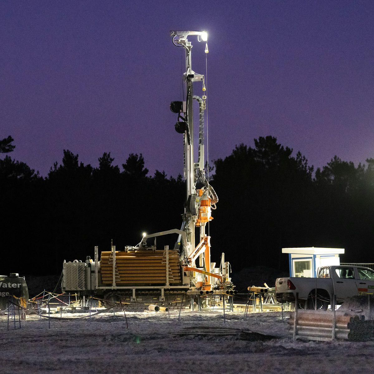Water well drilling rig at work